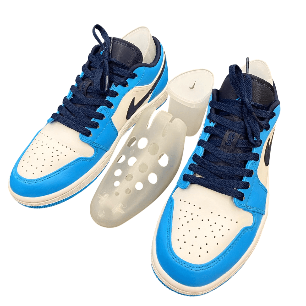 Shoe tree inside blue and white sneakers for sneaker cleaning and shoe restoration, preserving shape and preventing creases.